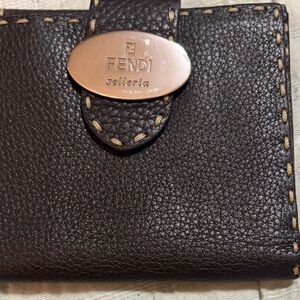 Fendi Brown Leather Selleria wallet with silver Logo Plate.  Dust bag included